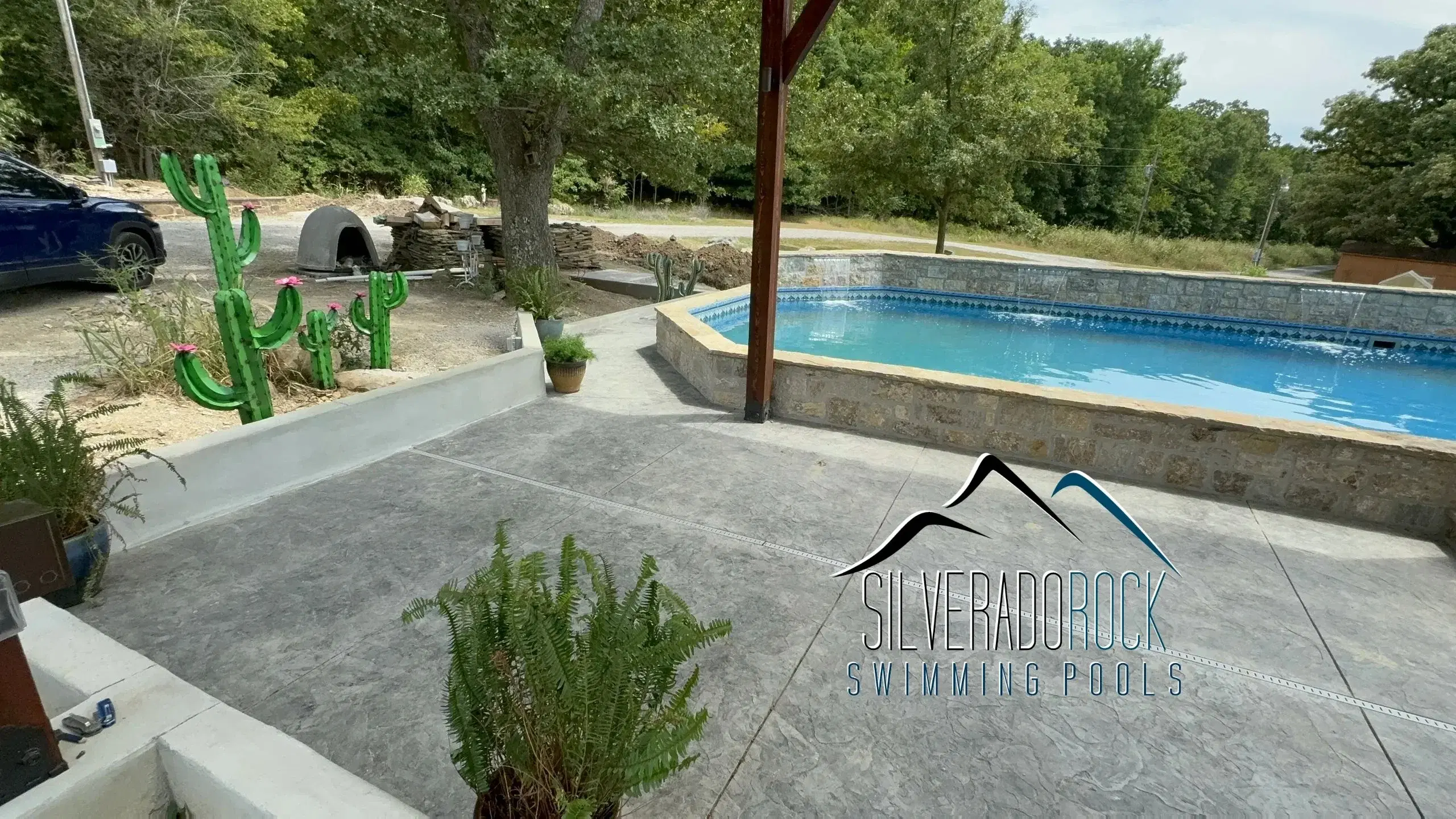 Installed rectangle pool with stamped concrete deck — Tulsa, OK