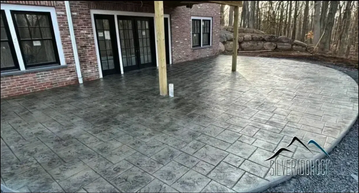 Stamped concrete patio installed by Silverado Rock Pools in Tulsa