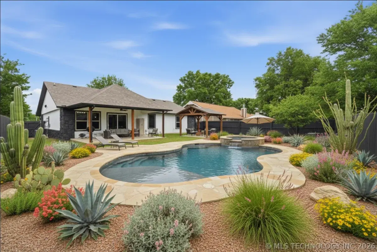 Semi-inground pool design concept for Tulsa backyard by Silverado Rock
